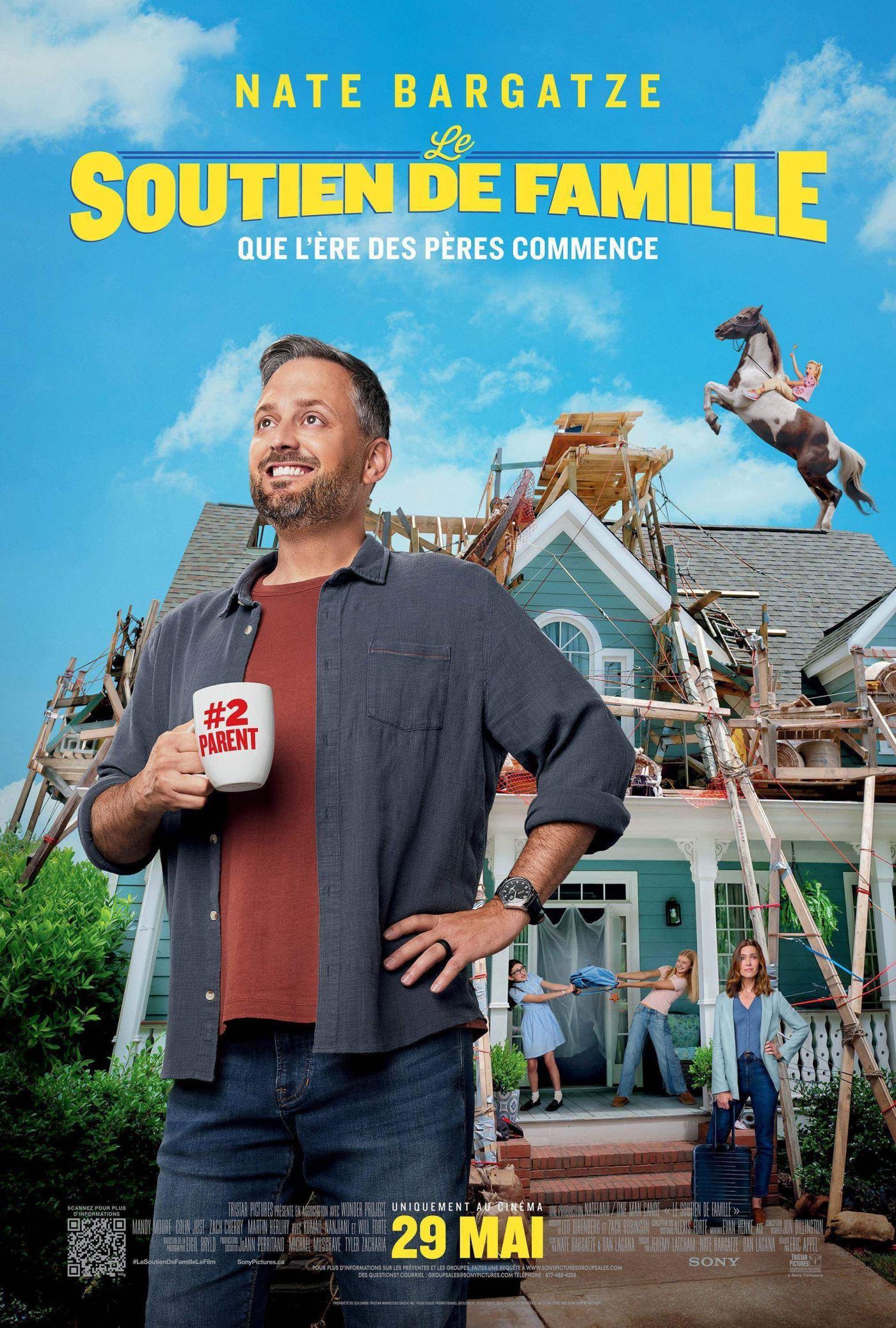 Nate Bargatze posing with a mug that says "#2 Parent" in front of a chaotic home.
